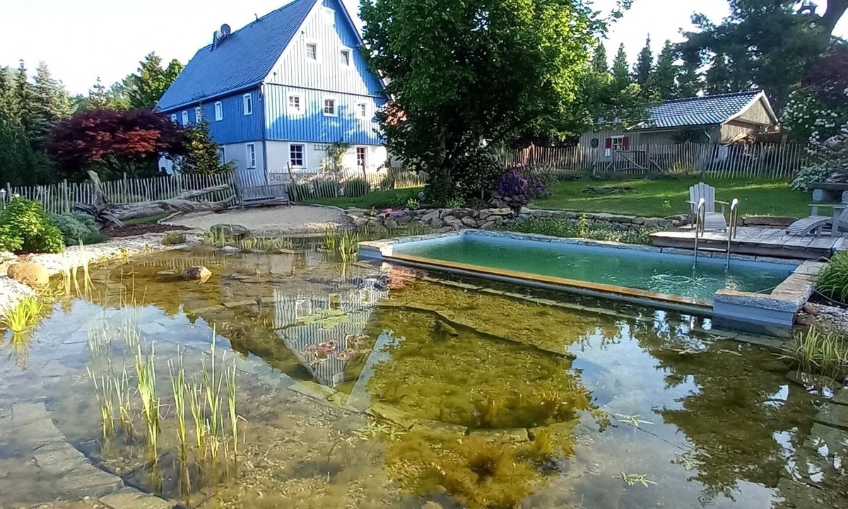 Oberrammenau Apartment | A family getaway by the lake with a pool, sauna, and fireplace—your soul will thank you
