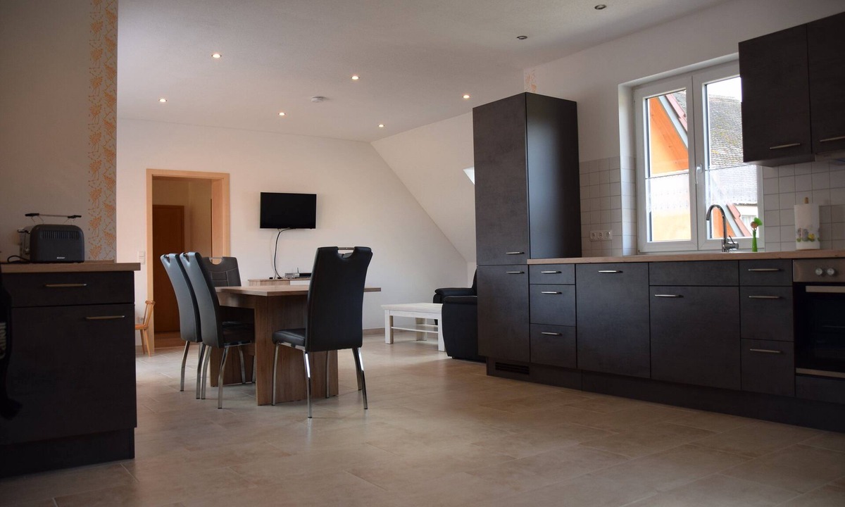 Weihenzell Apartment | Apartment Loberhof with south-facing roof loggia