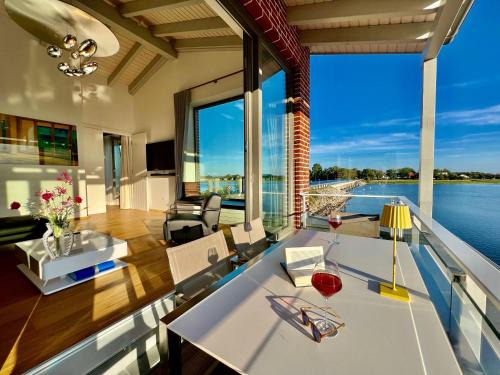 Waase Apartment | Apt "Sunset Lounge" in Waase - Ummanz - Meerblick, Kamin, Sauna
