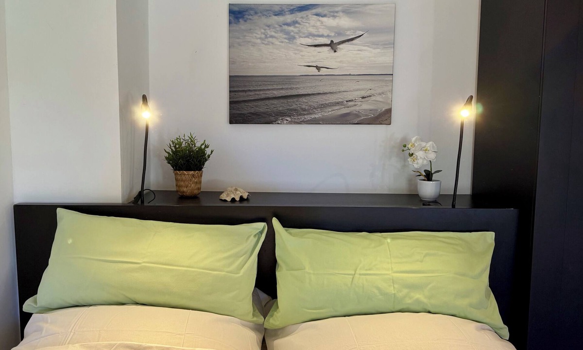 Hemmelsdorf Apartment | Beautiful vacation apartment by the lake with its own garden within cycling distance of the beach