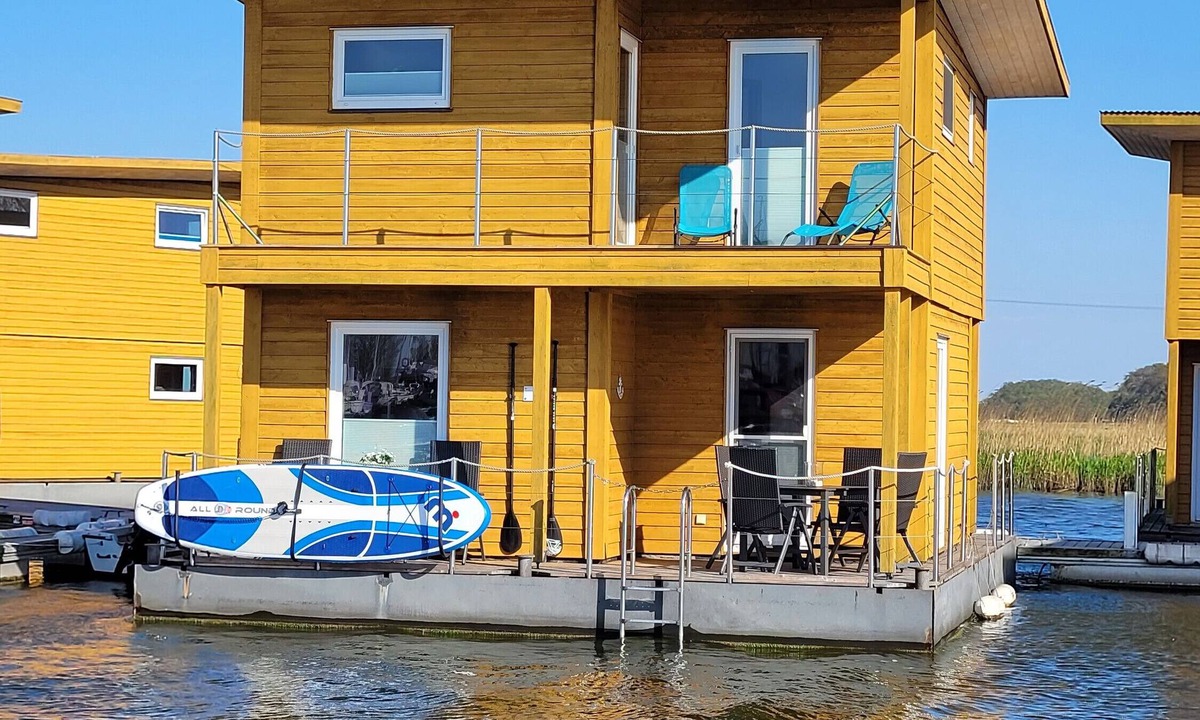 Kroeslin Boat Rental | Boat 'Floating House' with Lake View, Private Terrace and Wi-Fi