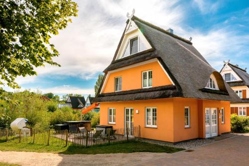 Hohenkirchen House | C 3 Reethaus Löwe mit Außenwhirlpool und Sauna