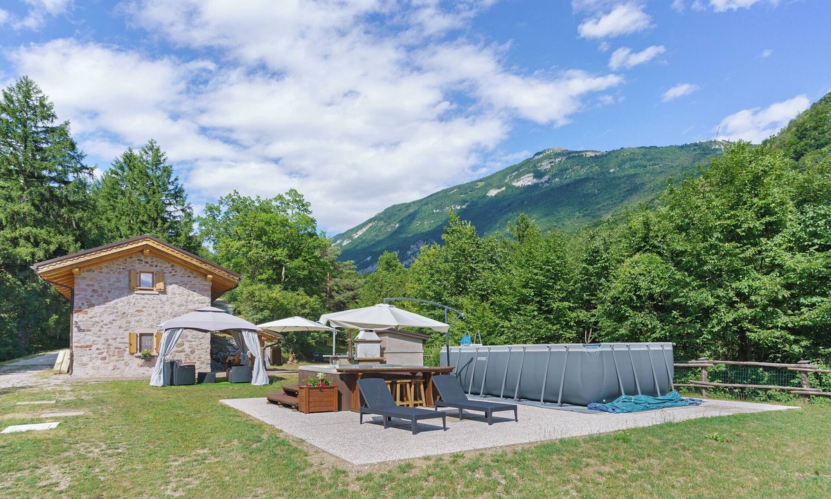 San Lorenzo in Banale Ski Chalet | Chalet 'Camillo' with Mountain Views, Private Pool and Garden
