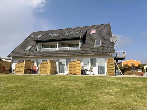 Alt Reddevitz Apartment | Haus Inselperle mit Blick auf den Bodden