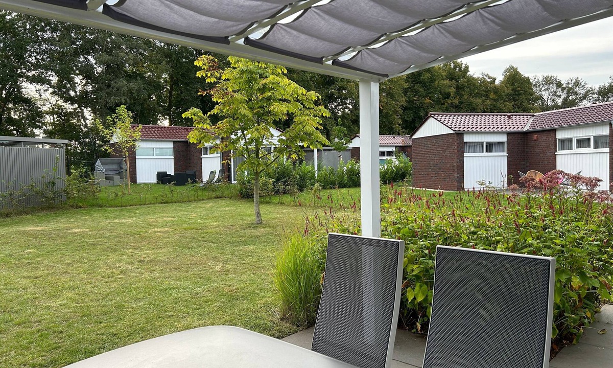 Schuettorf House | Holiday Home 'Haus 21 am See' with Large Grounds, Private Terrace, Garden & Wi-Fi
