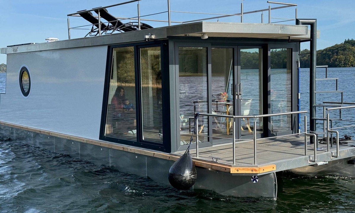 Dobin am See Boat Rental | Houseboat 'Kitilou' with Lake View, Private Terrace, and Wi-Fi
