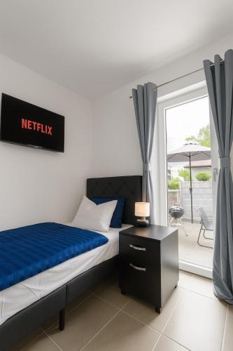 Straubing Apartment | LETA Homes - Komfortables Gästehaus - eigene Parkplätze & Traumterrasse