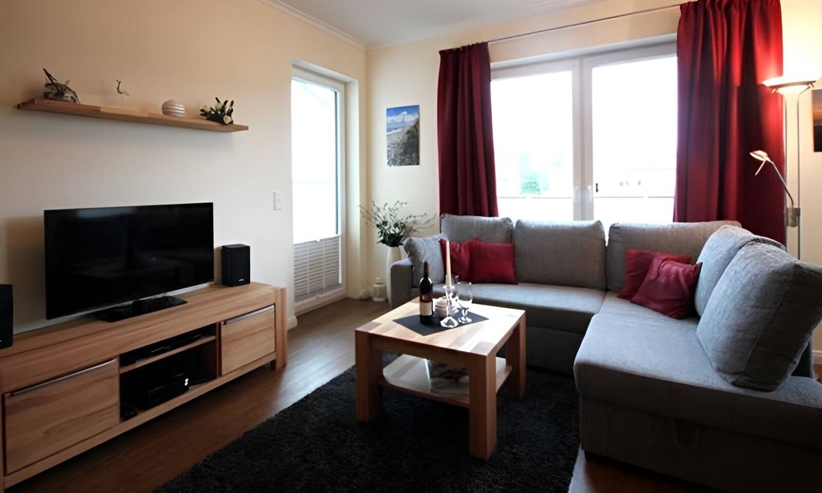 Boergerende-Rethwisch Apartment | Modern apartment with balcony, restricted sea view and parking in Börgerende