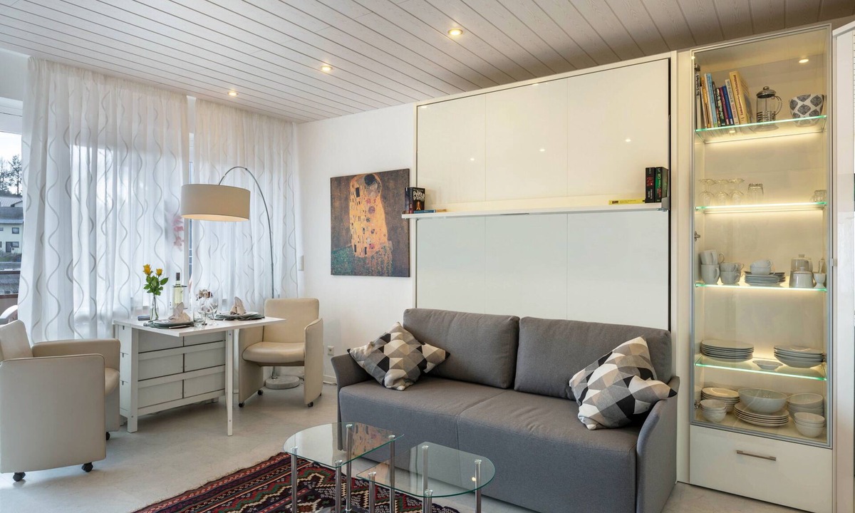 Schoenwald Apartment | Modern Holiday Apartment “Urs” with Mountain View, Balcony, Sauna & Pool