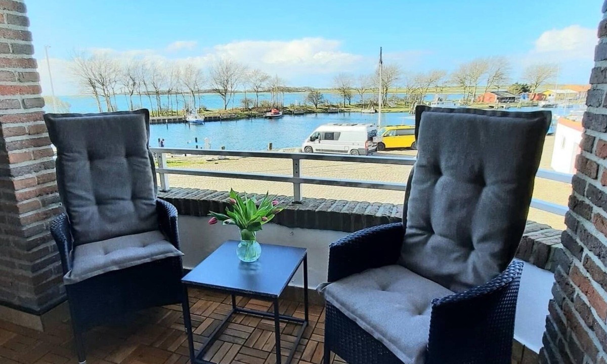 Orth Apartment | Relax in harbor bliss: dream holiday apartment with sea view on Fehmarn