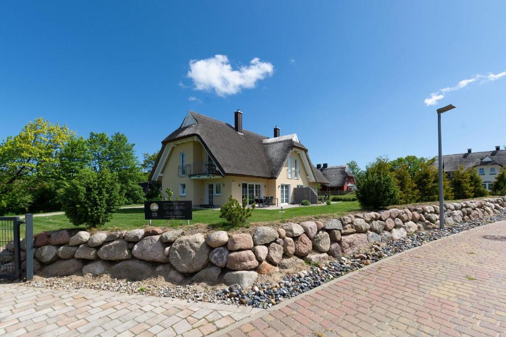 Lobbe Villa | Strandvilla "Babette" - BALO B, direkt am Meer, mit Sauna