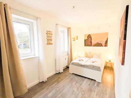 Lichtenhain Apartment | Urlaubsmagie Ferienwohnung Wiesengrün - direkt am Wanderweg - für 6P - W6