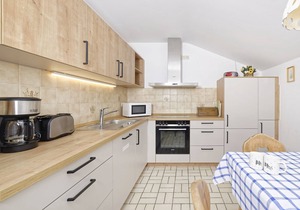 Apartment II in the adjoining house, 55 sqm with separate bedroom, south-facing balcony