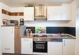 Cosy apartment with terrace and garden access in a quiet wooded area