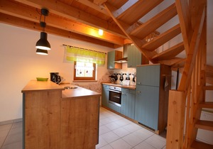 Detached vacation home with fireplace, balcony and garden in the Via Claudia vacation village