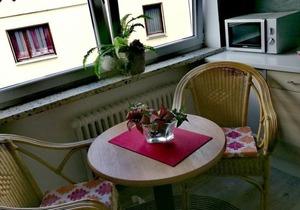 Hannah vacation apartment with balcony terrace and cozy garden furniture