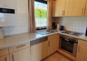"Pure relaxation: Discover Holiday Village Hochbergle House 37 on Lake Lechsee!"