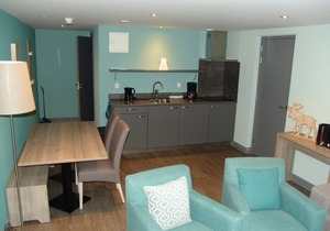 Relax wonderfully and into an apartment with a view of the slopes/mountains.