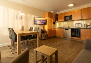 Top floor apartment with sunny balcony and beautiful view of Lake Schloon -