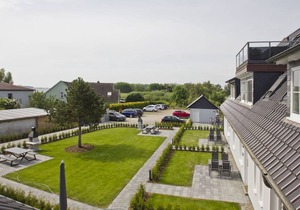 Vacation apartment with sea view, balcony and garden - Haus Inselblick FeWo MEERluft -