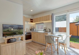 Welcome to this modern vacation home with panoramic views of the lake!