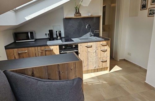 Muhlwinkl Apartment | 1-raum Ferienwohnung 30qm im Dachgeschoss mit Südbalkon/bergblick