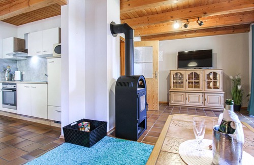 Kattersdorf House | In the idyllic forest village of Regen welcomes you this cozy and authentic semi-detached house.