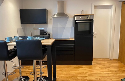 Flintsbach A. Inn Apartment | 1,5 rooms, top equipped, 4 pers, basement, parking lot, self check-in