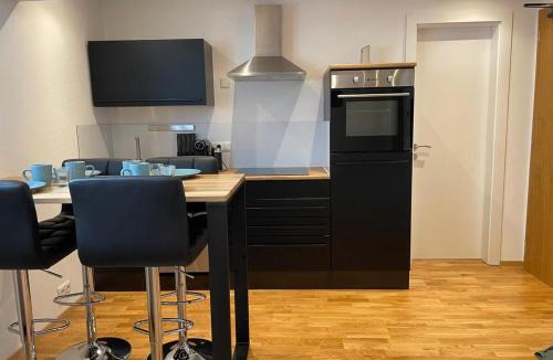 Flintsbach A. Inn Apartment | 1,5-Zimmer, Top ausgestattet, 4 Pers, Souterrain, Self Check-in, Parkplatz, Netflix & Amazon Prime
