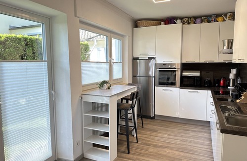 Nonnenhorn Apartment | 240 m² Ferienwohnung direkt am Bodensee mit privatem Strand und Fasssauna