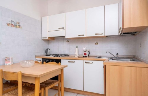 Colugna Apartment | A comfortable and welcoming 60 square meters apartment, perfect for four people, located on the fourth floor of a period building without an elevator.The property is located in a quiet area, allowing our guests to easily and quickly reach the center of U