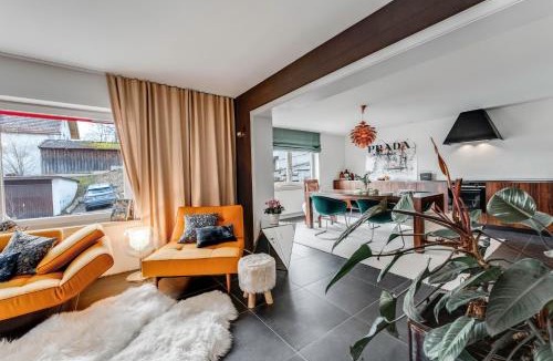 Ettensberg House | Alpen Ferienhaus mit Garten, Kamin, Spielzimmer und Bergblick