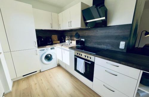 Bad Kohlgrub Apartment | Alpine Gemütlichkeit für 4 mit großer Sonnenterrasse