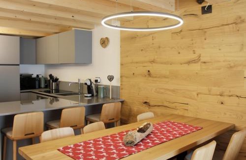 Dosso Veronza Apartment | ALPINE LOFT - Residence Veronza con piscina, Dolomiti Affitti