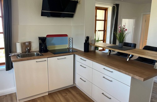 Stove Apartment | Apartment 3 with 1 bedroom (2-4 pers.) upstairs/1 pet allowed - Villa Seeheim Ferienobjekt