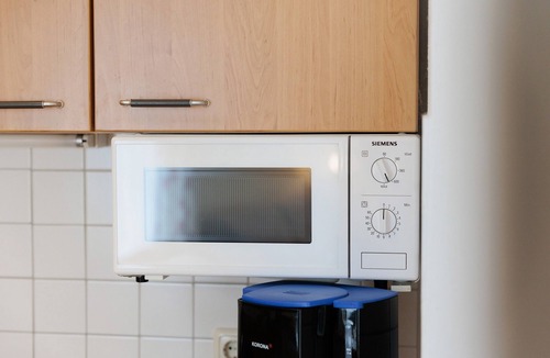 Oberaudorf Apartment | Apartment 'Fewo Brünnstein- Nr 28 Pool, Sauna' with Mountain View, Shared Garden & Wi-Fi