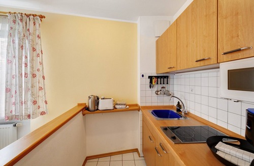 Oberaudorf Apartment | Apartment 'Fewo Brünnstein- Nr 28 Pool, Sauna' with Mountain View, Shared Garden & Wi-Fi