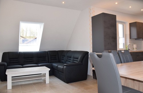 Weihenzell Apartment | Apartment Loberhof with south-facing roof loggia