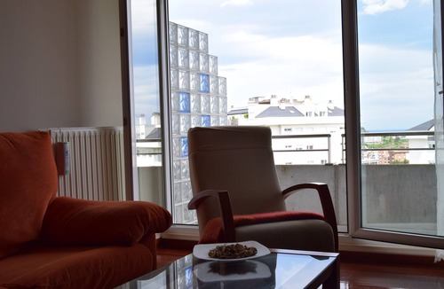 Castro Urdiales Apartment | Apartment with 2 Terraces, Sea Views, Pool, and Garden