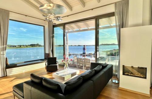 Waase Apartment | Apt "Sunset Lounge" in Waase - Ummanz - Meerblick, Kamin, Sauna