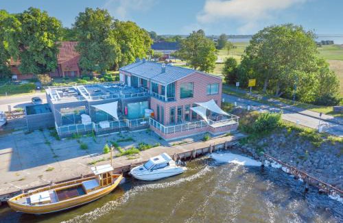 Waase Apartment | Apt "Sunset Lounge" in Waase - Ummanz - Meerblick, Kamin, Sauna