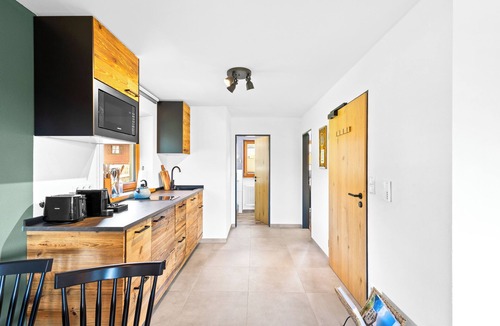 Reit im Winkl Apartment | Atelier Walchsee | mountain view, pool & sauna
