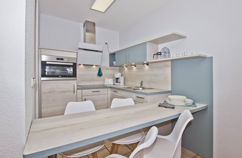 Gohren Apartment | Balcony, free use of the AHOI adventure pool and sauna - Villa Karola FeWo 04