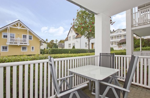 Gohren Apartment | Balcony, free use of the AHOI adventure pool and sauna - Villa Karola FeWo 04