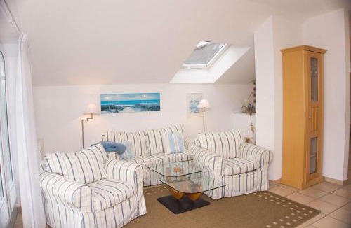 Gohren Apartment | Balkon mit traumhaften Meerblick, gratis Nutzung vom AHOI Erlebnisbad und Sauna in Sellin Dünenhaus FeWo05