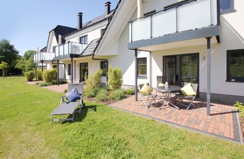 Moenchgut Peninsula Apartment | Beachfront apartment with terrace, use of swimming pool and sauna - Rex Rugia H-1010 -