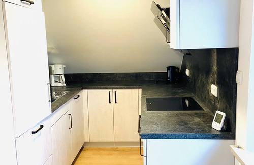 Haunstetten-Sud Apartment | Beautiful top floor apartment with loft character