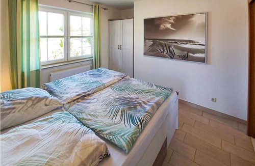 Monchgut-Granitz Apartment | "Between the Baltic Sea beach and the Bodden, the Boddenhus apartment house awaits you with its brig