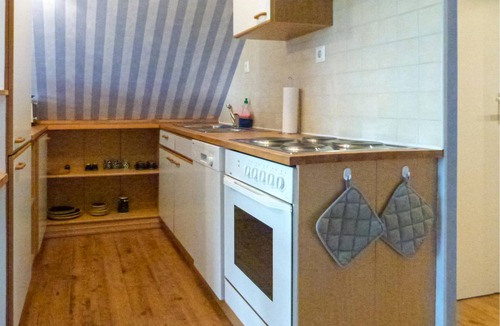 Monchgut-Granitz Apartment | Between the Baltic Sea beach and the Bodden, the Boddenhus apartment house awaits you with its brigh