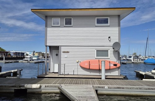 Ostvorpommern Boat Rental | Boat 'Floating House' with Lake View, Private Terrace and Wi-Fi